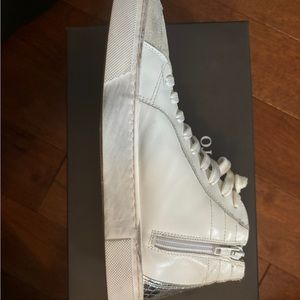 Steve Madden zip up high top sneakers. Silver detail.